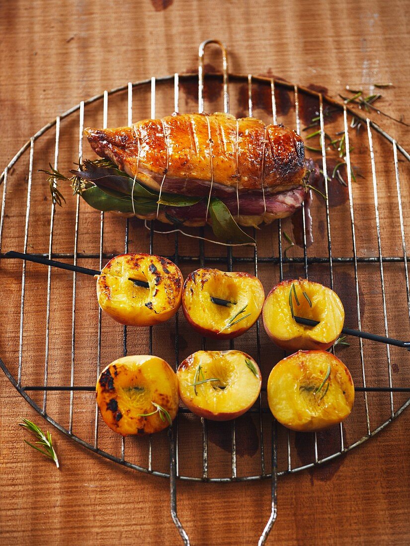 Stuffed chicken breast and barbecued peaches