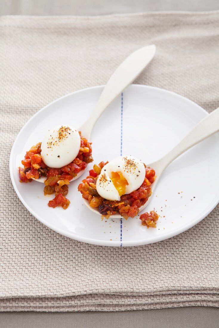 Poached eggs on tomato chutney