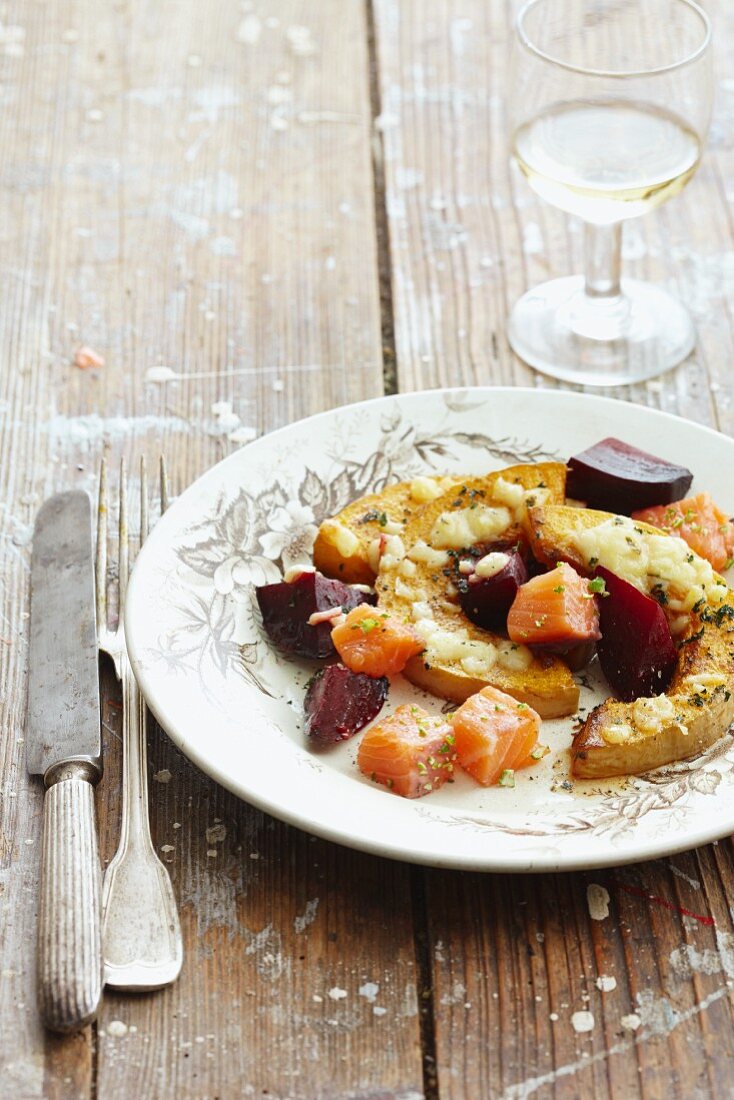 Baked squash with beetroot and salmon