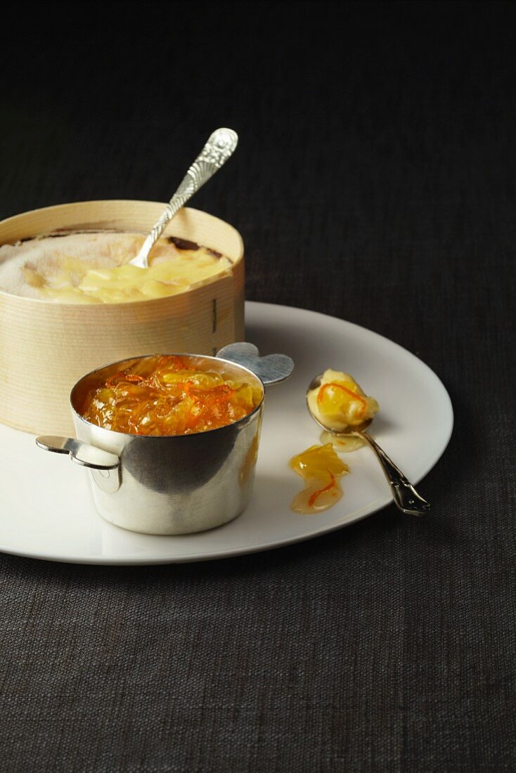 Baked Vacherin cheese with citrus marmalade