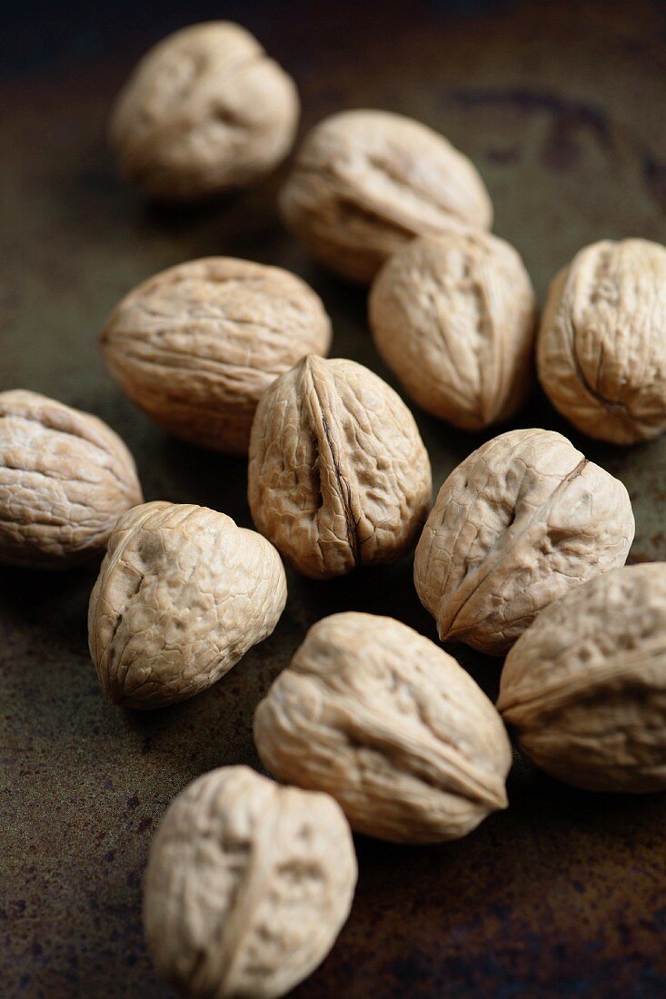 Walnuts on a wooden surface