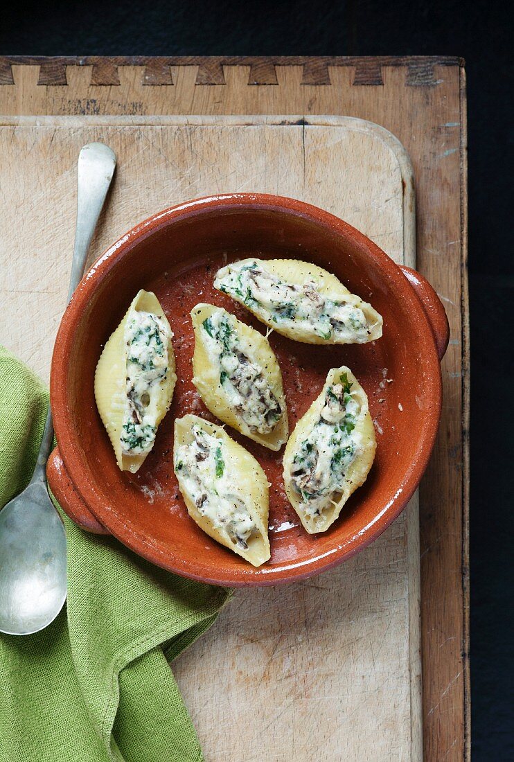 Large pasta shells stuffed with ricotta, spinach, mushrooms and parmesan