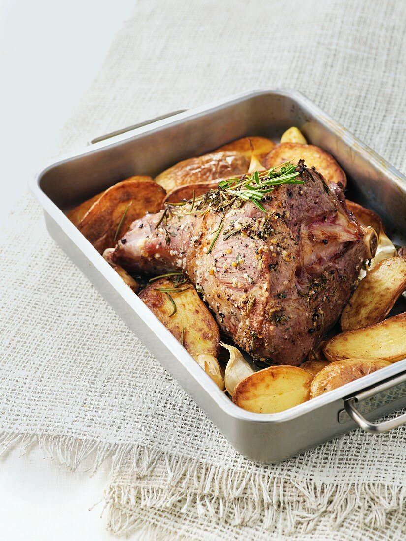 Leg of lamb with potatoes and herbs