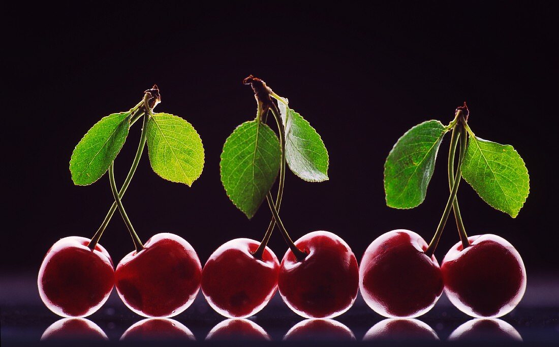 Three pairs of cherries