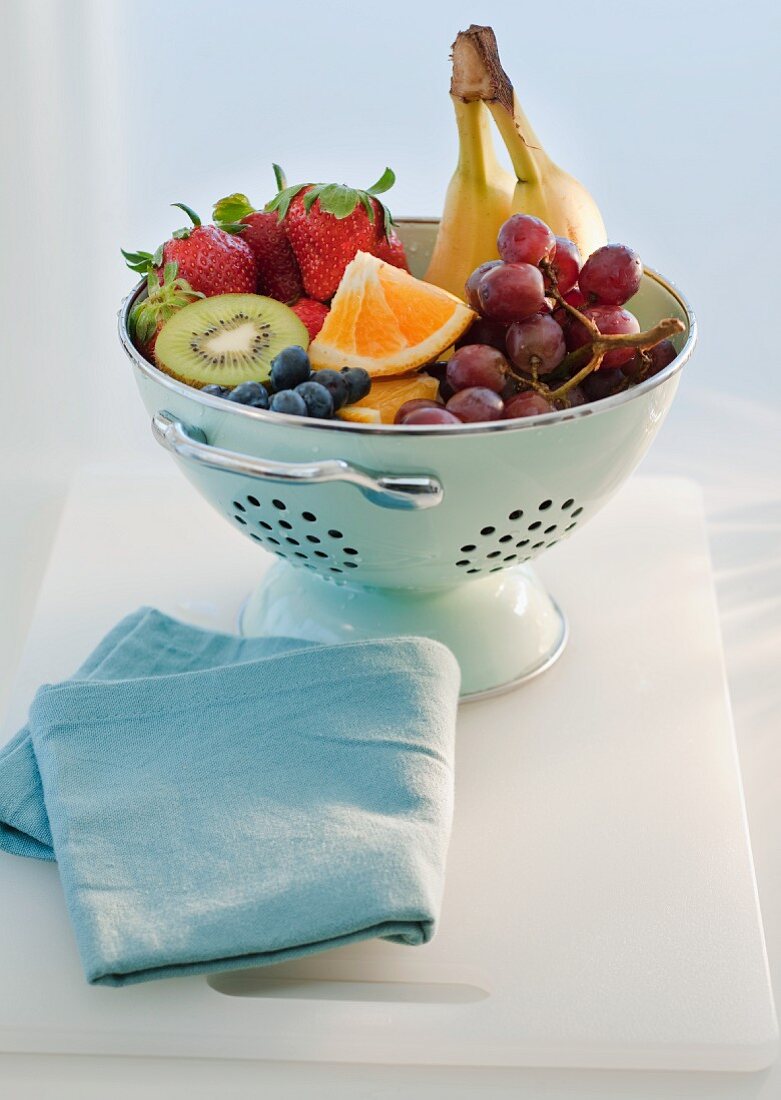 Colander with fruits