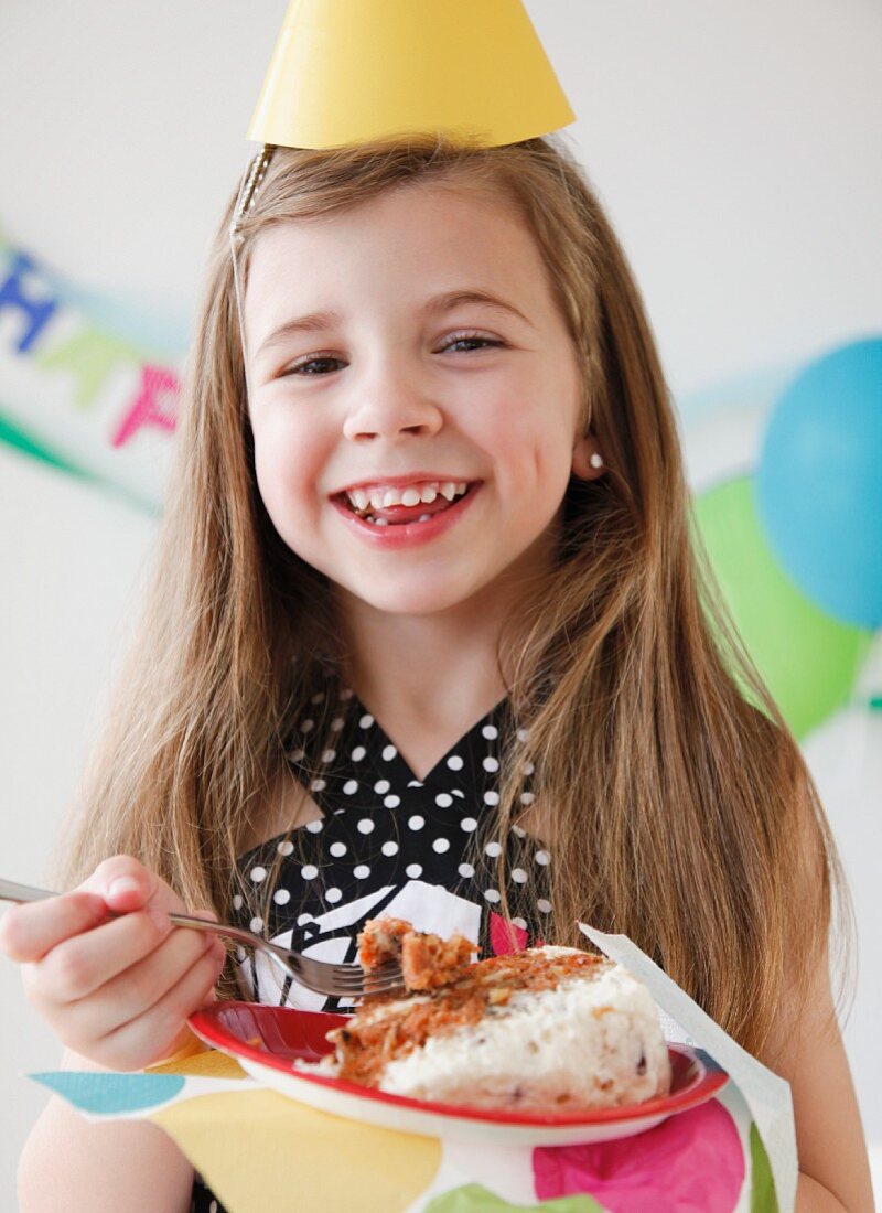 Child at Birthday eating cake