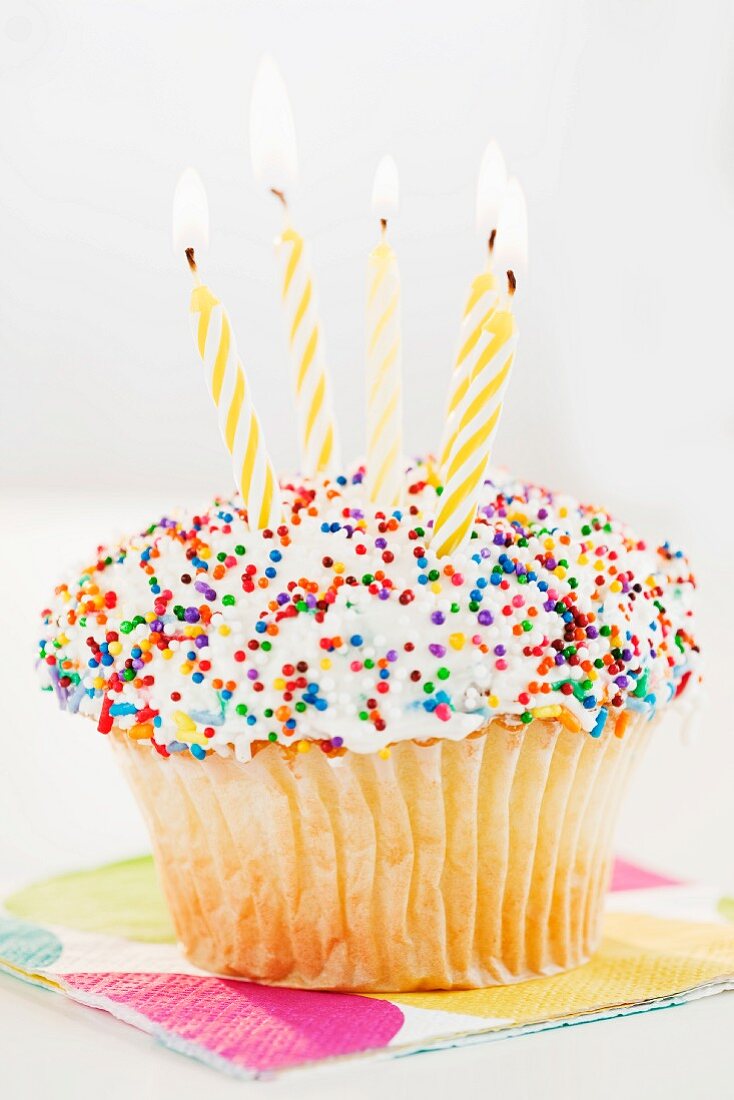 Cupcake mit Geburtstagskerzen