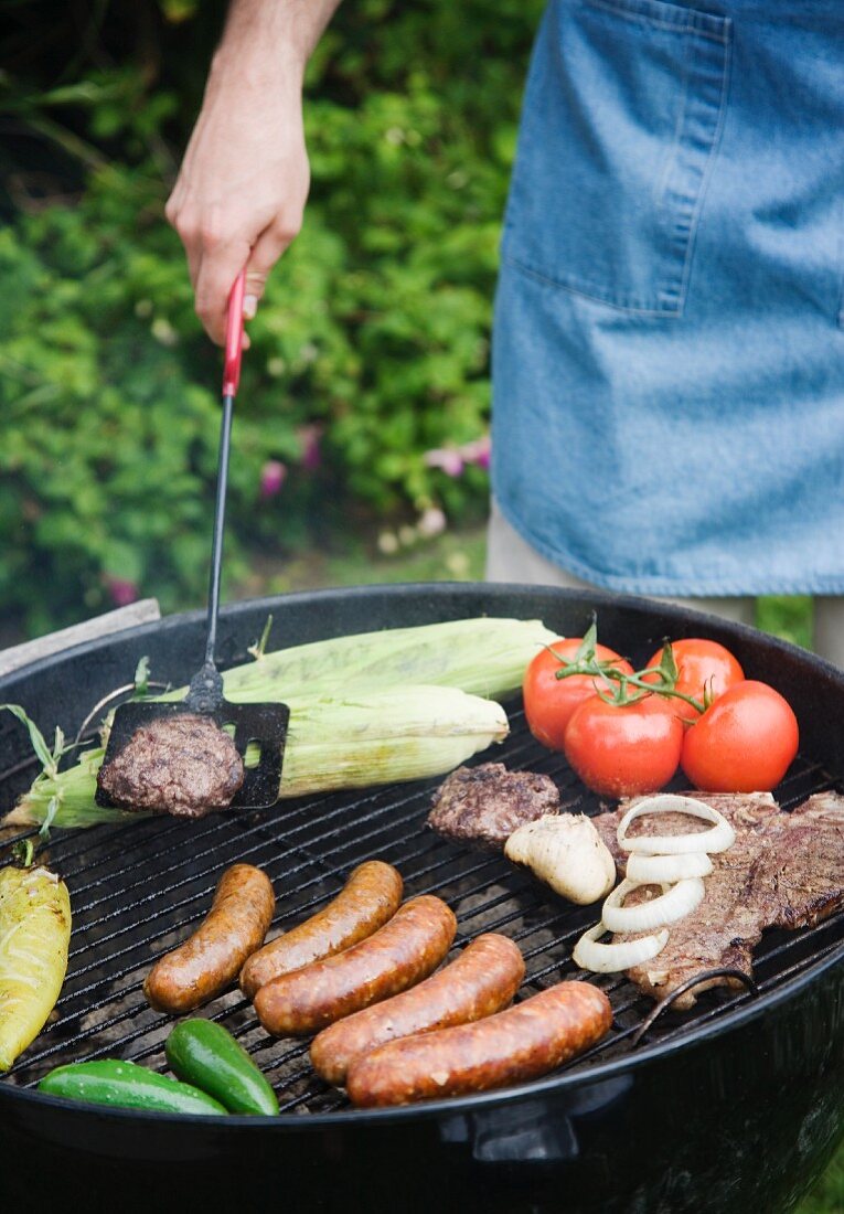Grilling food outdoors in summer