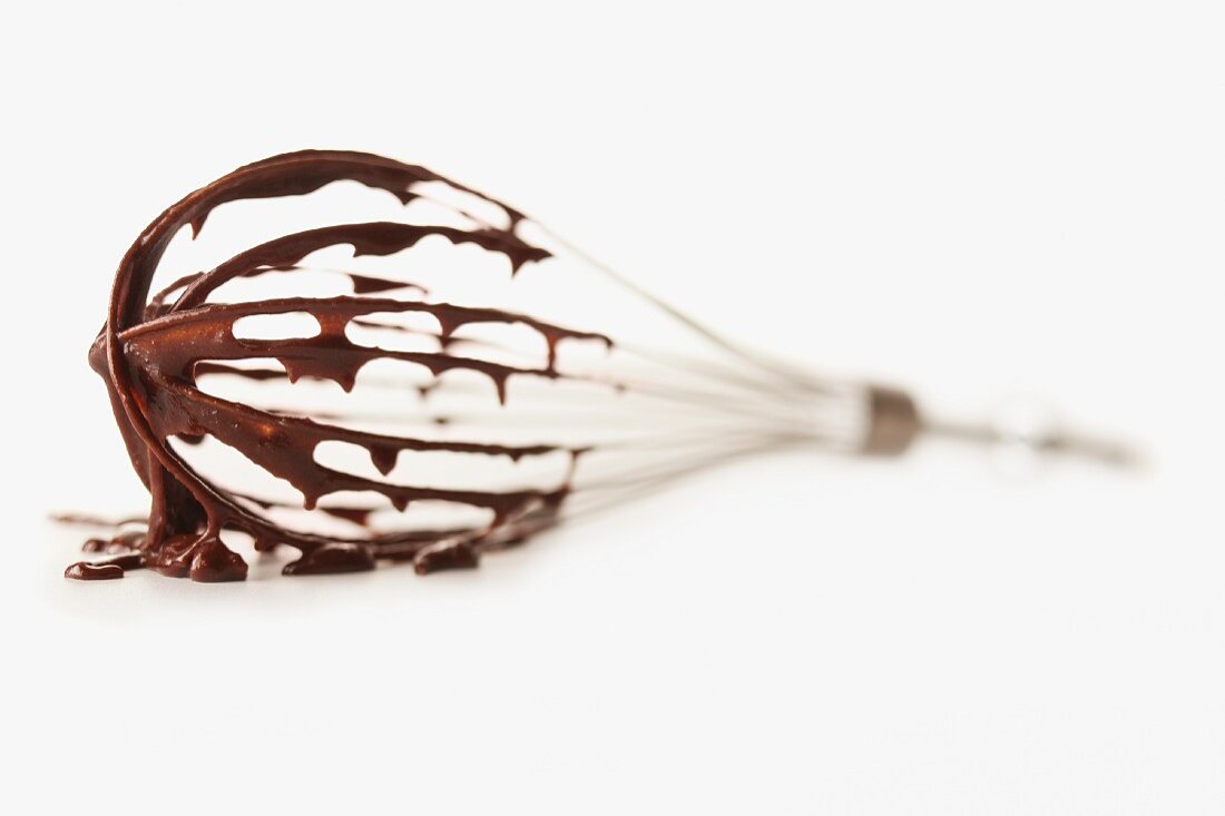 Wire whisk on white background