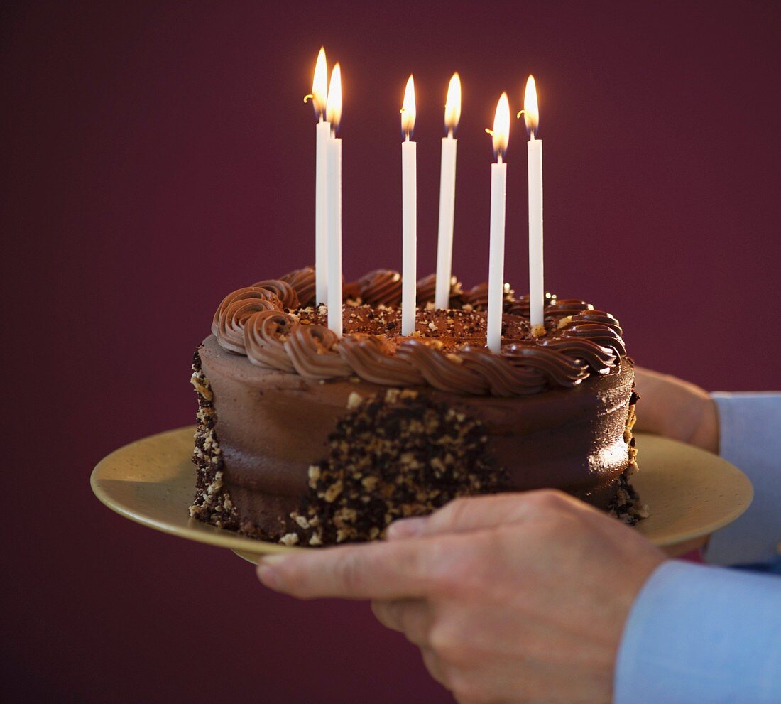 Birthday cake with burning candles