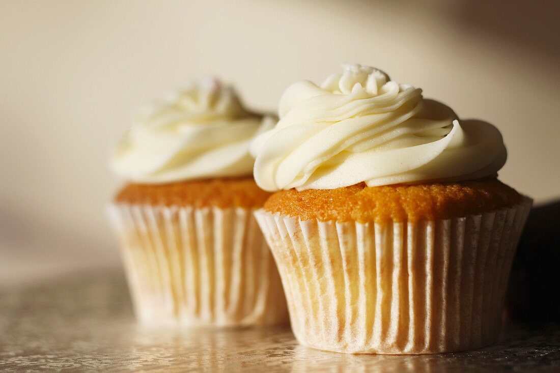 Two buttercream cupcakes