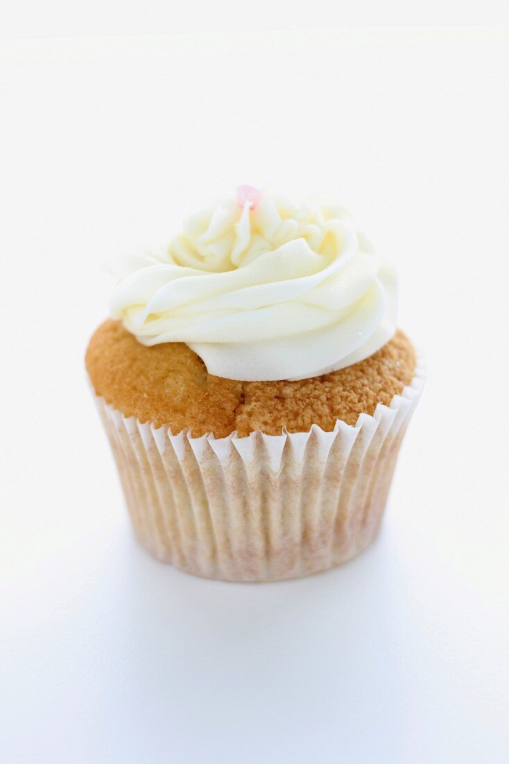 A cupcake topped with buttercream icing