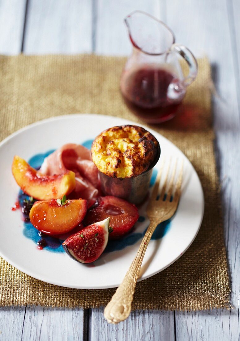 Fruit salad with ham and baked ricotta