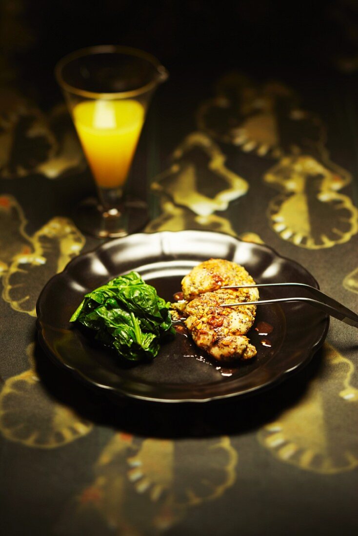 Breaded sweetbread with spinach