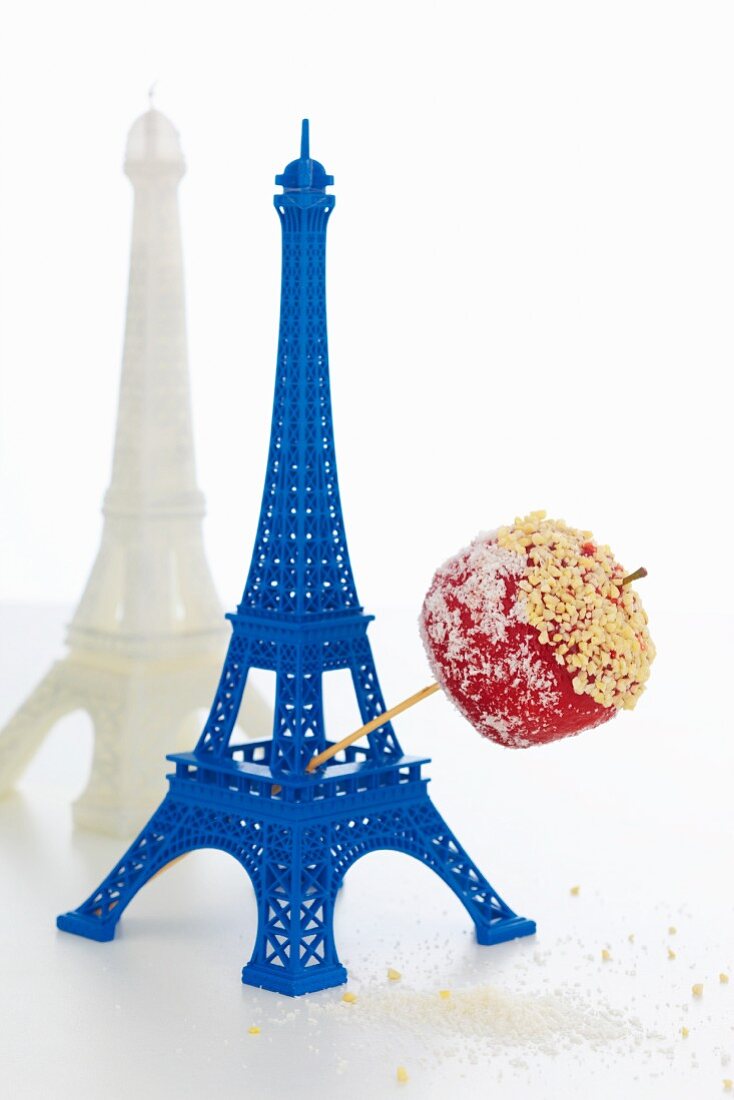 Eiffel tower with a red candy apples