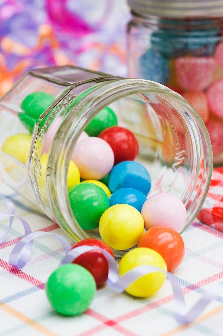 Colorful gum balls in a glass jar