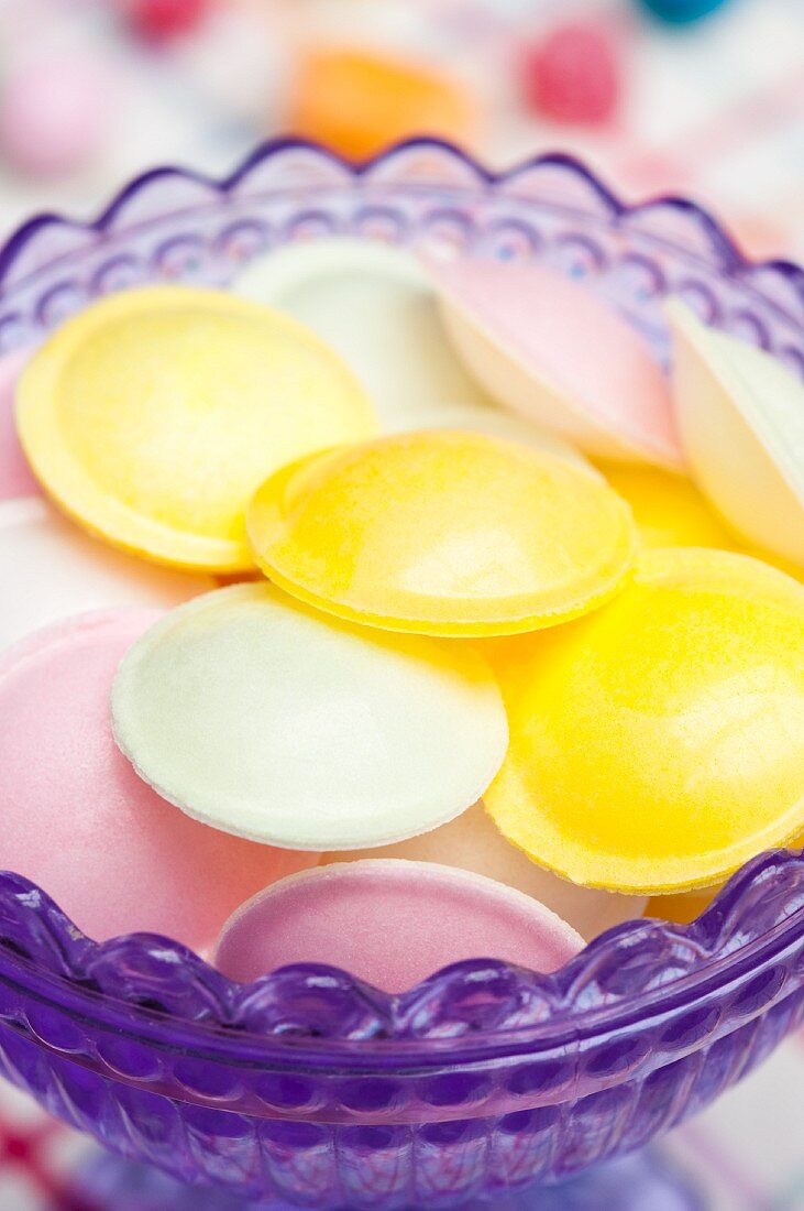 Flying saucer candies in a glass dish