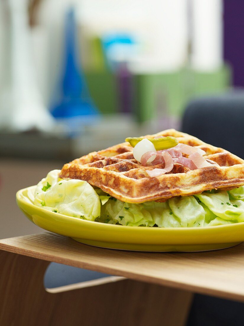 Potato waffles with ham and lettuce