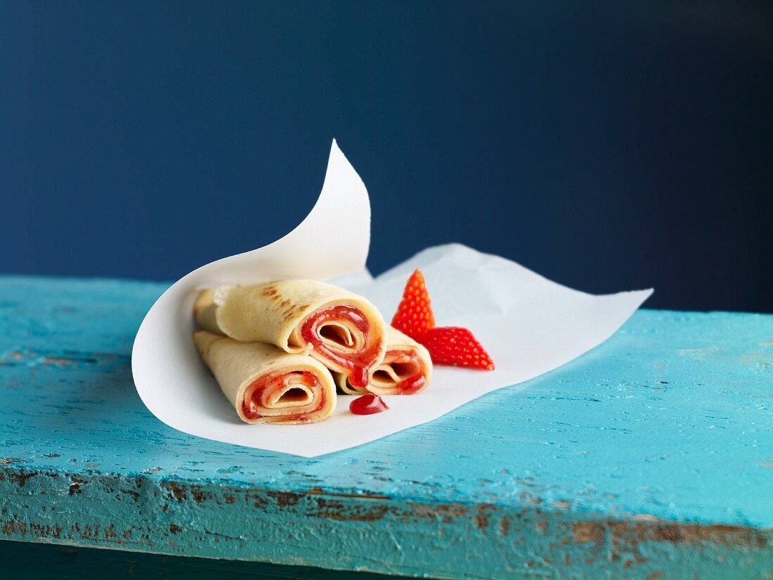 Crepe rolls filled with strawberry jam