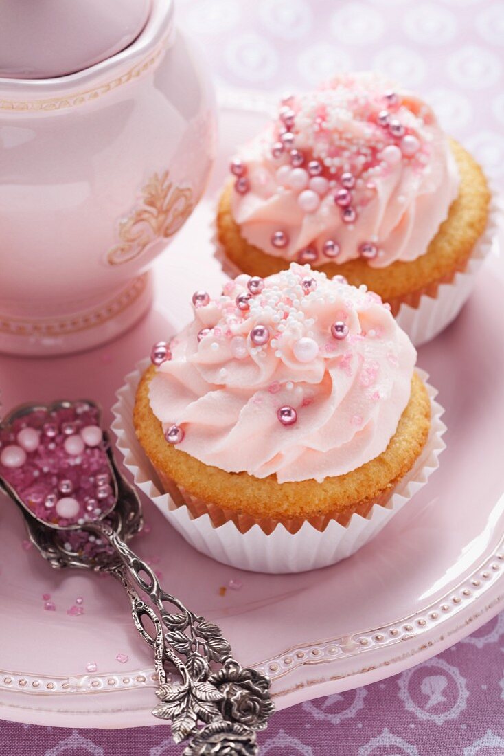 Pink cupcakes with sugar pearls