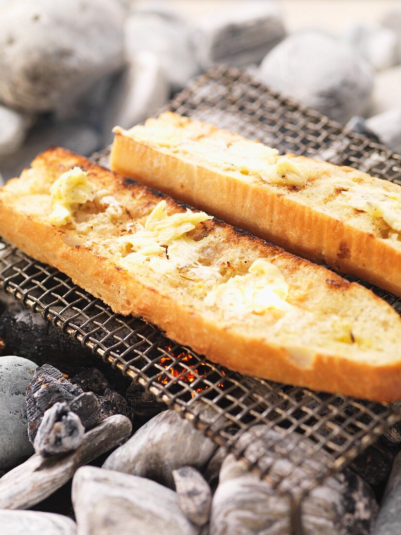 Garlic baguettes on the barbecue
