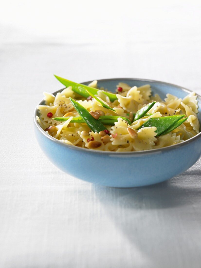 Farfalle with pine nuts and sugar snap peas
