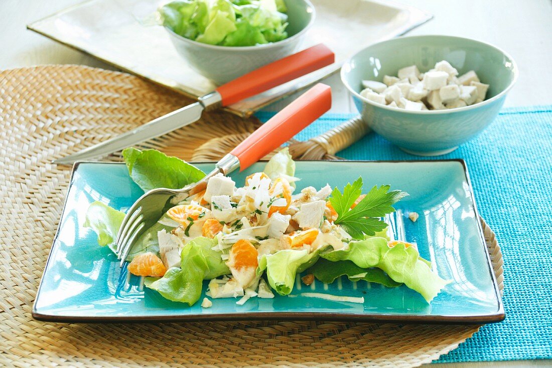 Exotic poultry salad with tangerines