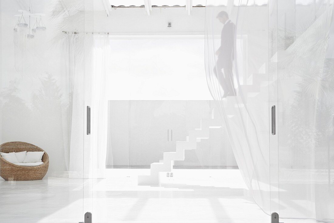 Spain, Businessman walking down stairs