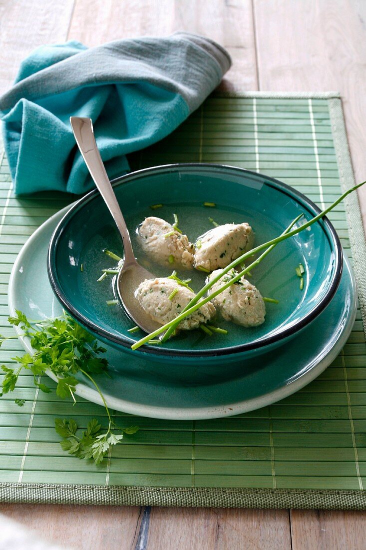 Soup with herb dumplings