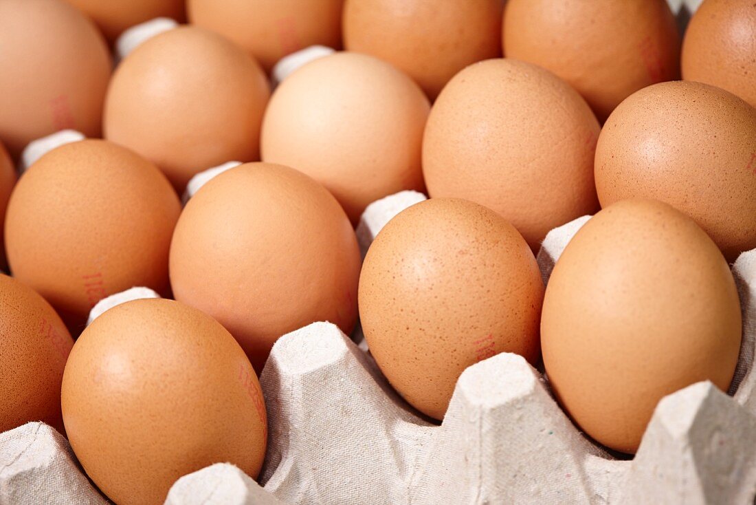 Brown eggs in egg box