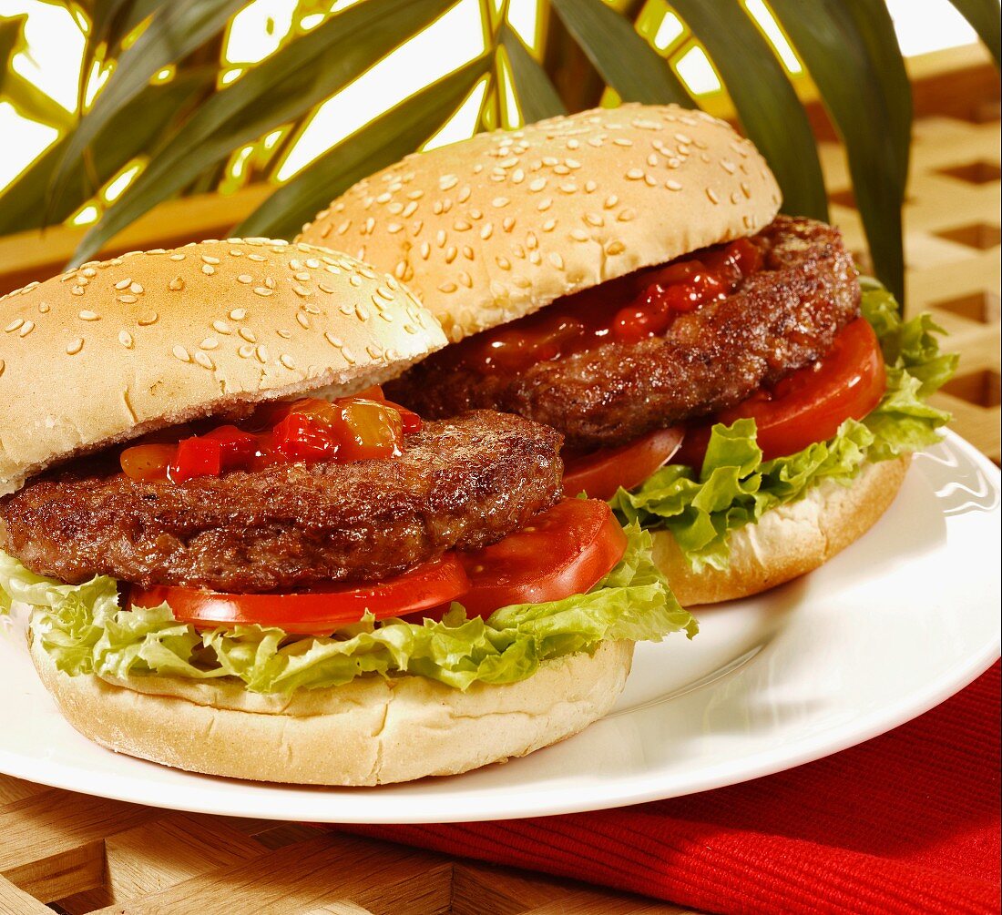 Hamburgers with tomatoes and lettuce