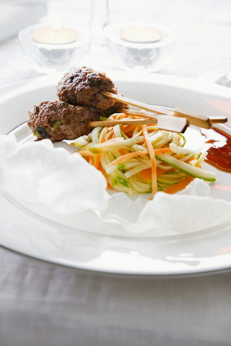 Beef skewers with steamed vegetables