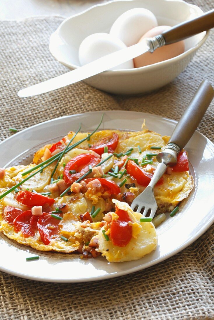 A farmer's breakfast with tomatoes