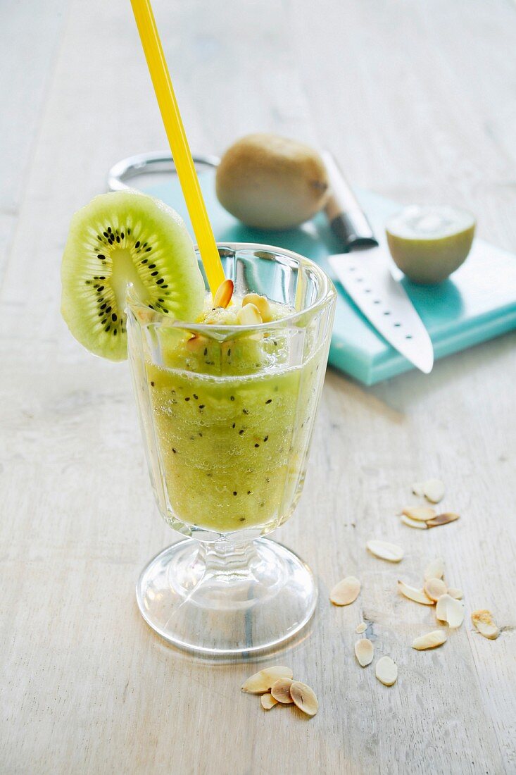 Pineapple and kiwi shake with slivered almonds