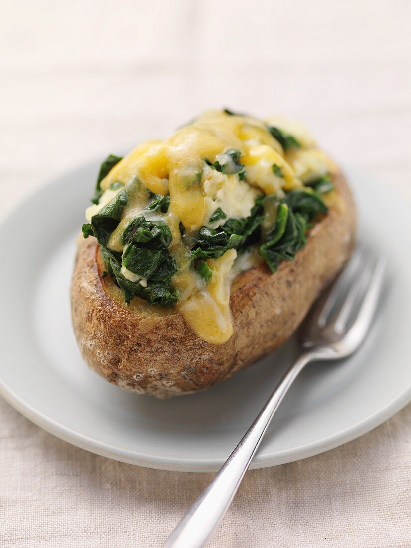 Twice-baked potato with cheese and spinach