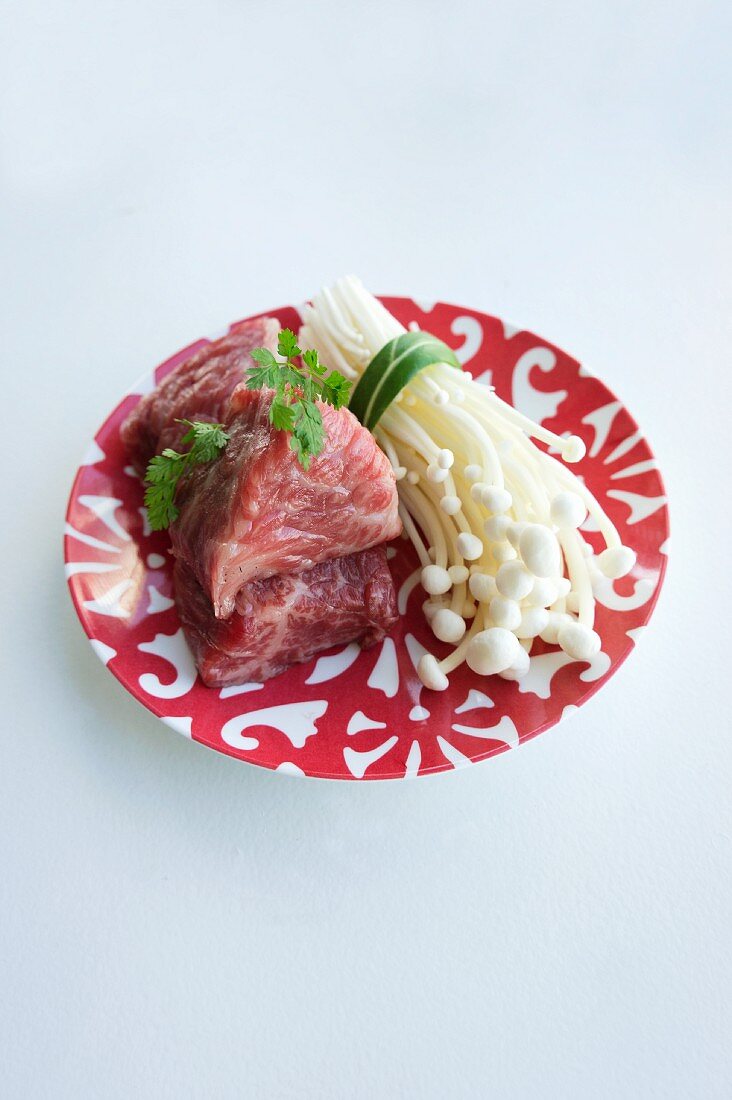 Wagyu beef with chervil and enoki mushrooms