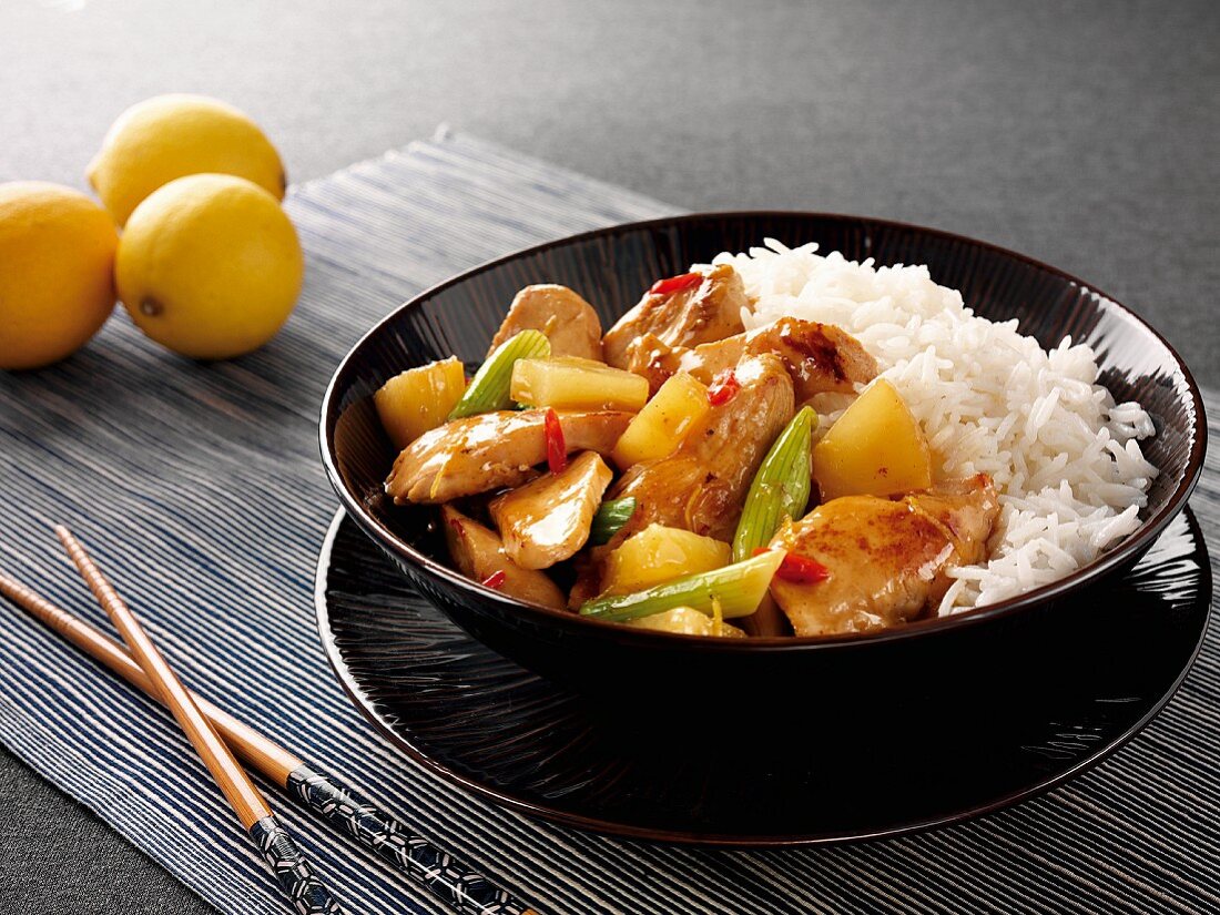 Sweet and sour chicken with pineapple and rice (Asia)