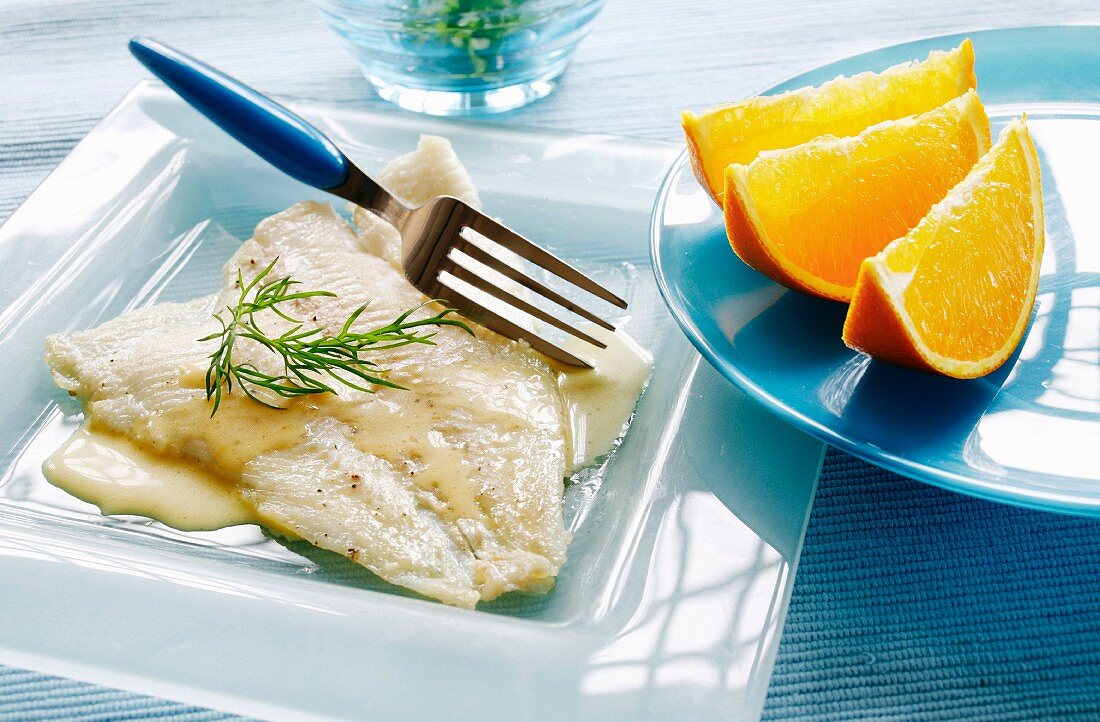 Plaice fillets with orange and cream sauce