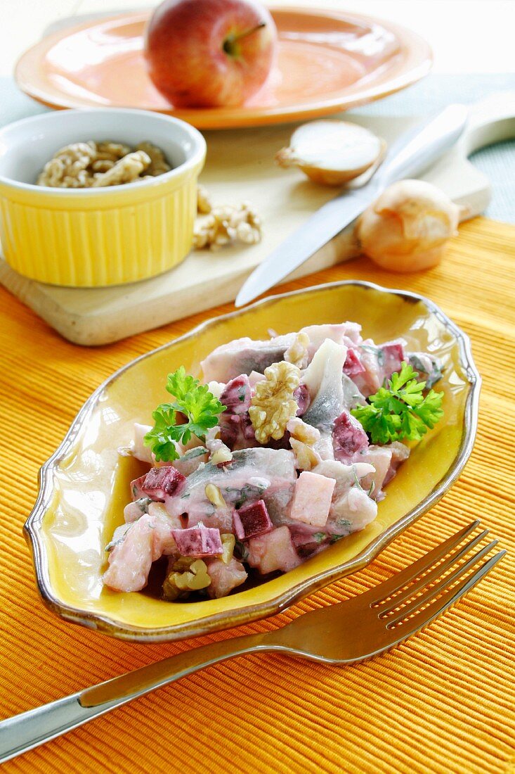 Potato salad with young herring, beetroot and walnuts (The Netherlands)