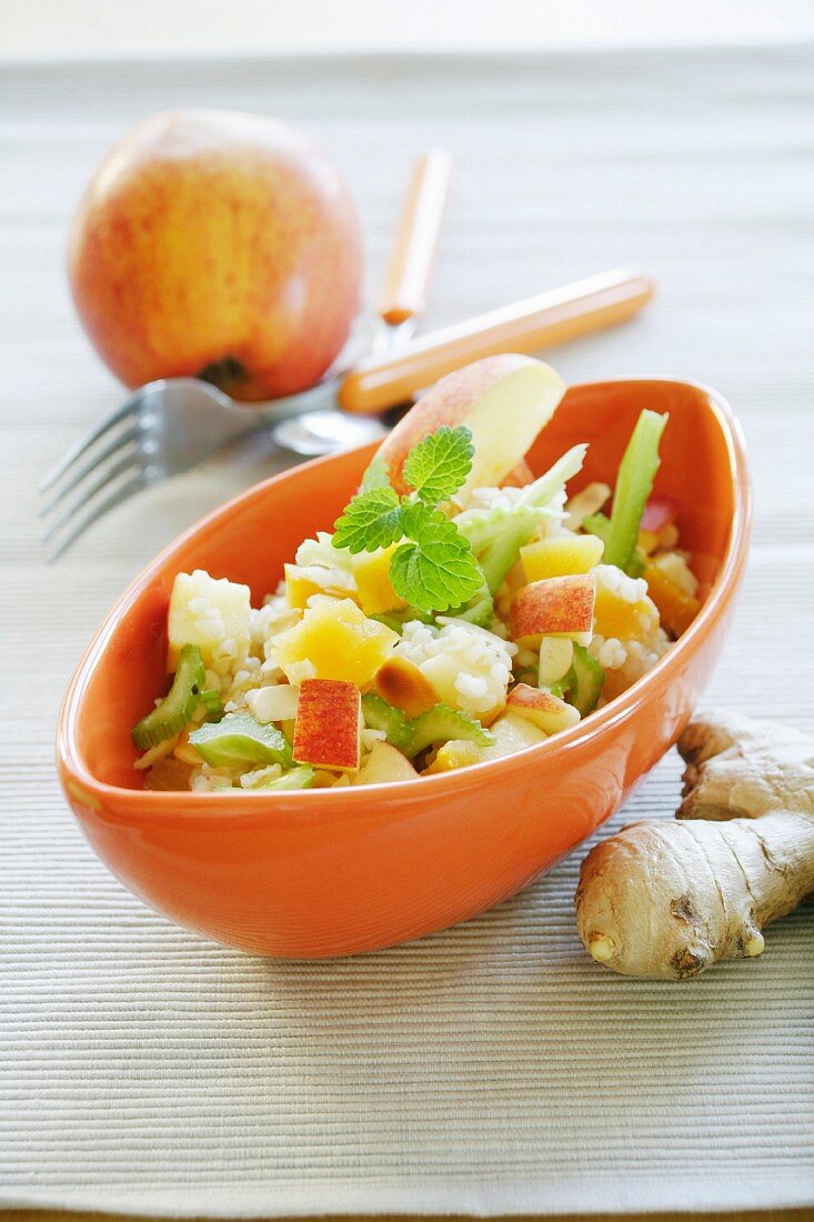 Bulgur salad with apples, dried apricots and celery