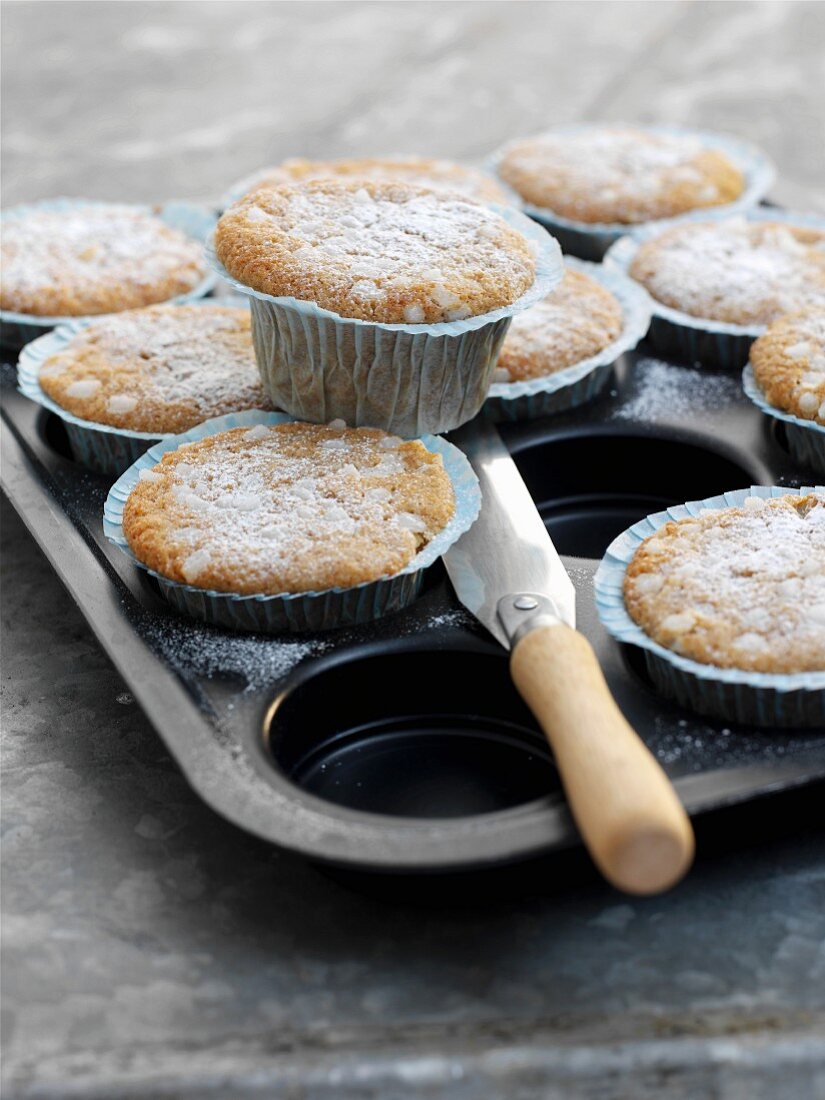 Apple and cinnamon muffins dusted with icing sugar