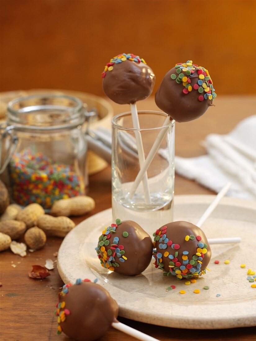 Peanut and ginger cake pops with sugar confetti
