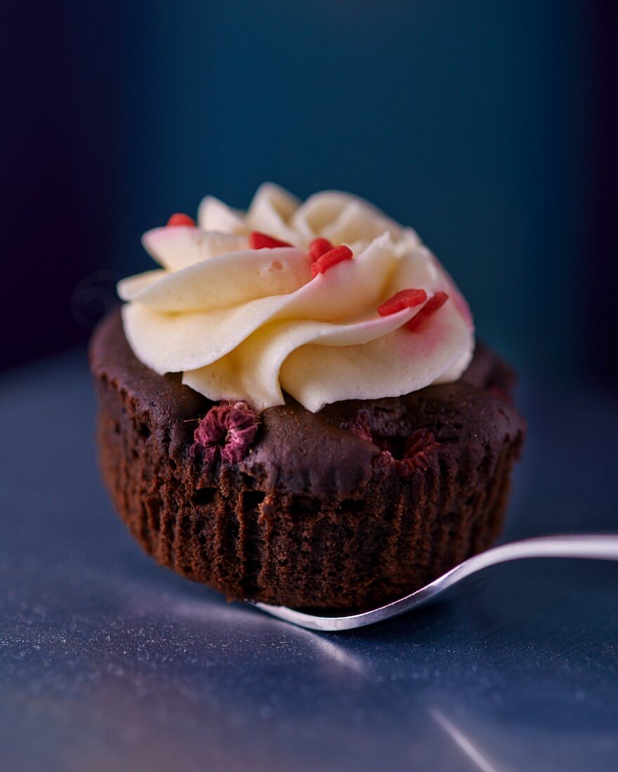 Chocolate cupcake with sugar hearts