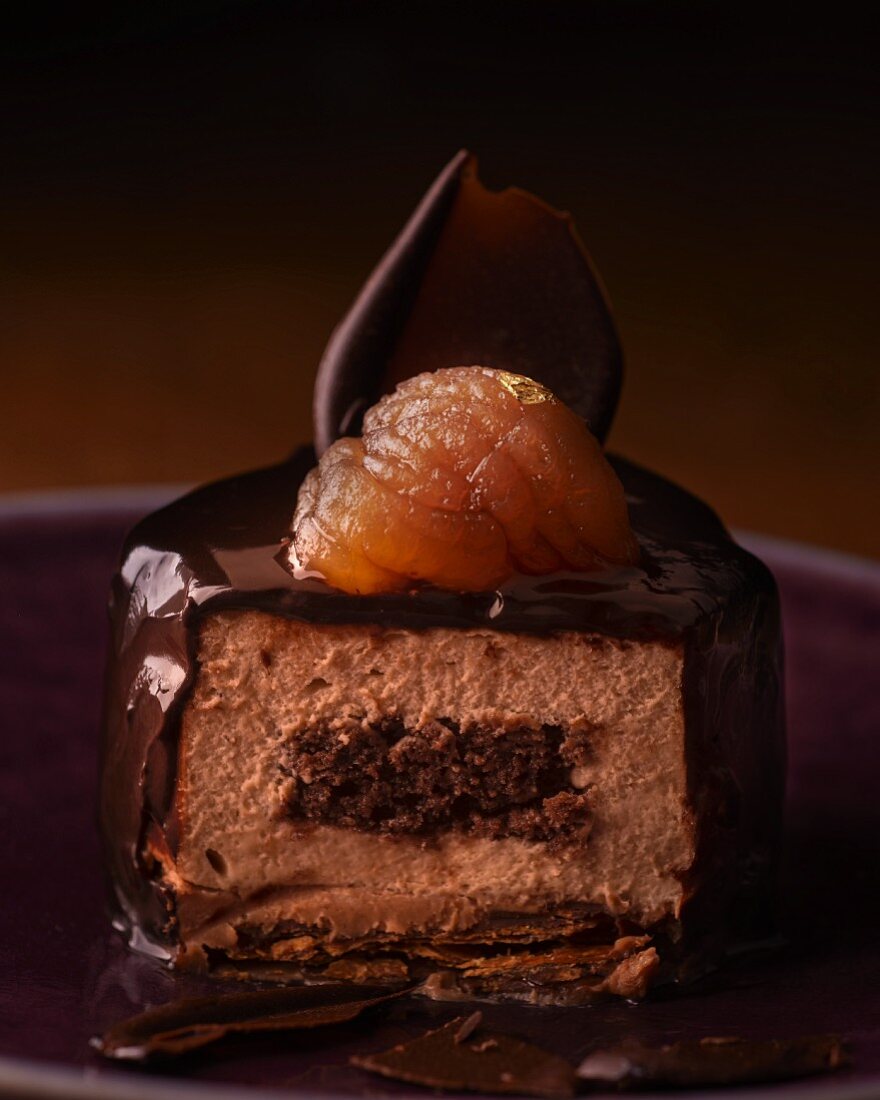 Individual chocolate torte topped with a marron glacé