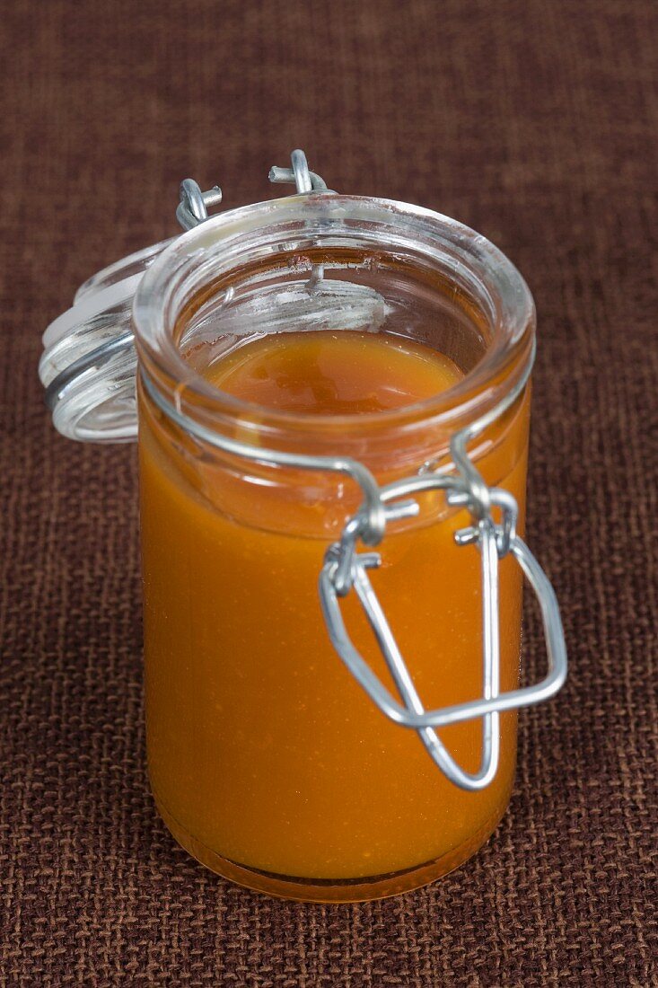 Caramel sauce in a preserving jar