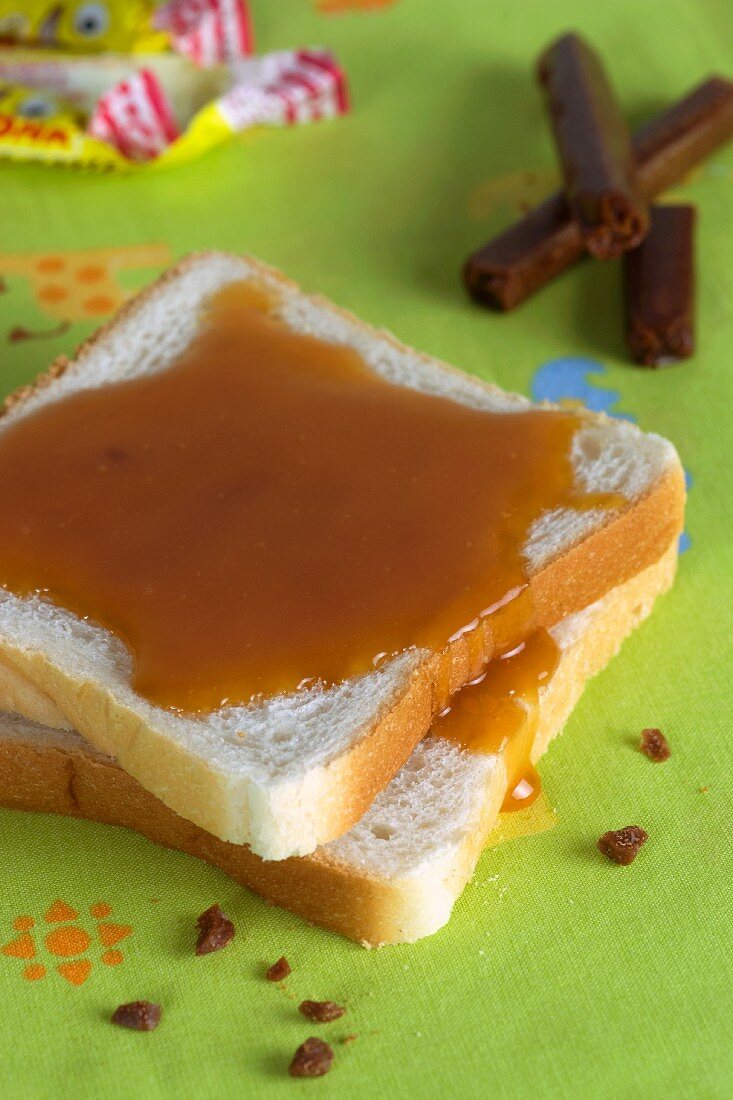 Sliced bread with caramel sauce