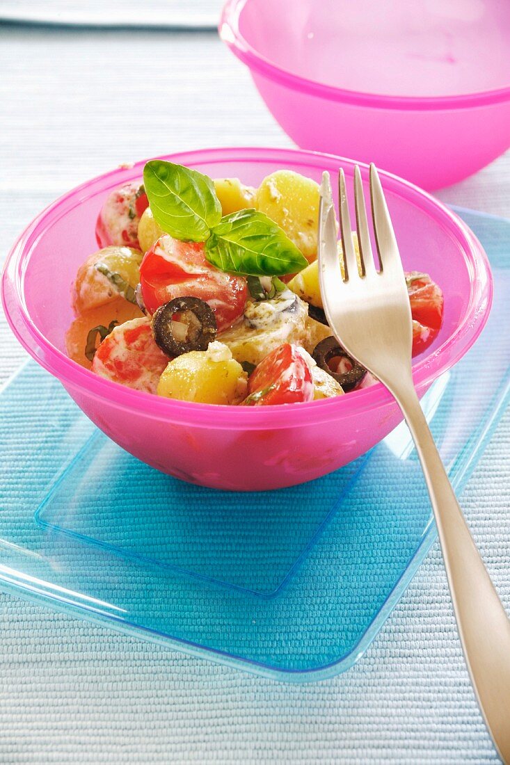 Potato and tomato salad with basil