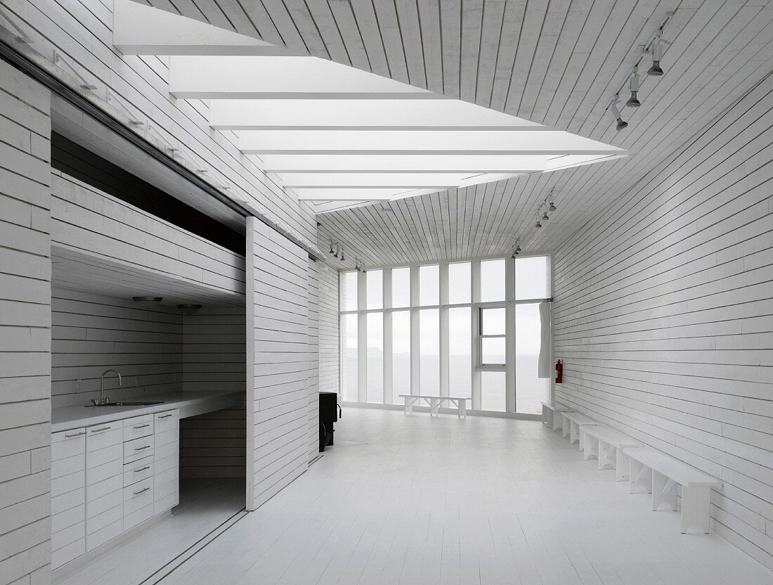 Eco-house interior with kitchen niche and wooden walls (Long Studio, Fogo Island, Canada)