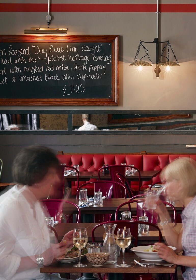 Guests eating in a Jamie's Italian restaurant in Cheltenham, England