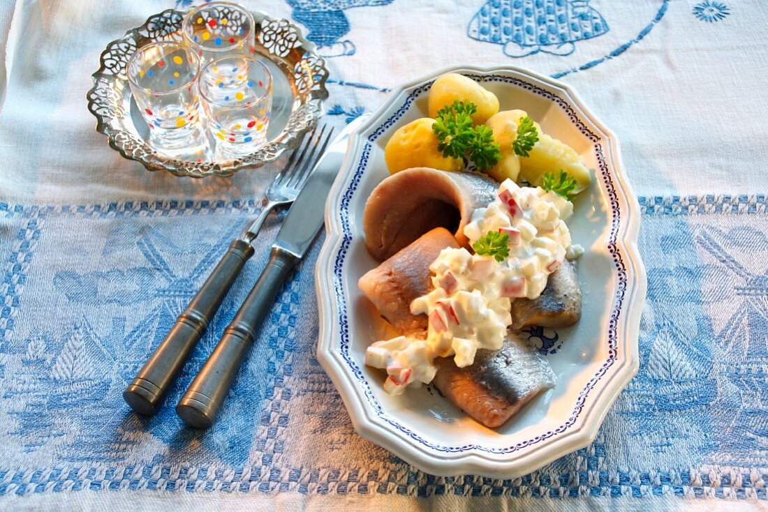 Heringsstipp (marinated, preserved herring dish) with boiled potatoes